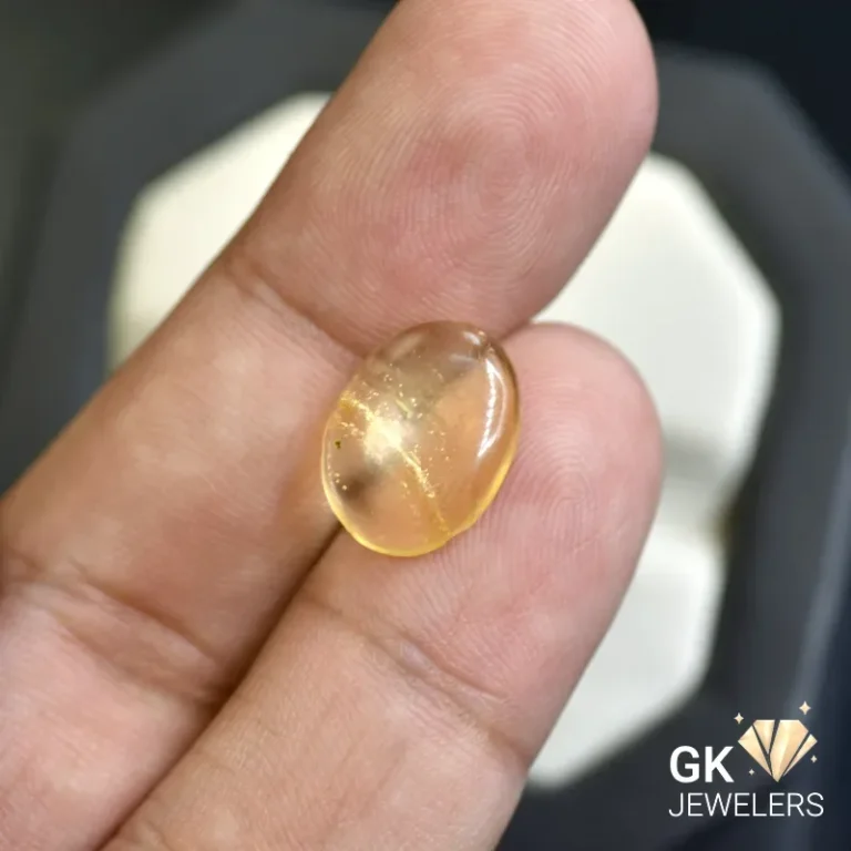 natural amber 1.85ct yellow cabochon stone, GK Jewelers Pakistan authentic gemstone photo