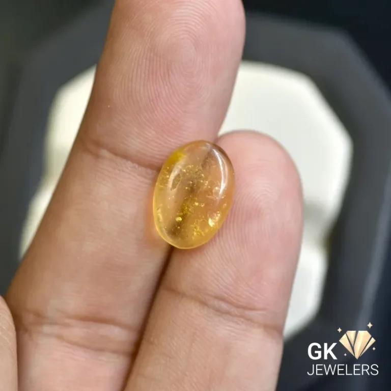 natural amber 1.43ct yellow cabochon stone, GK Jewelers Pakistan authentic gemstone photo