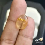 natural amber 2.35ct yellow cabochon stone, GK Jewelers Pakistan authentic gemstone photo