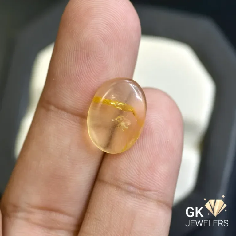 natural amber 2.35ct yellow cabochon stone, GK Jewelers Pakistan authentic gemstone photo