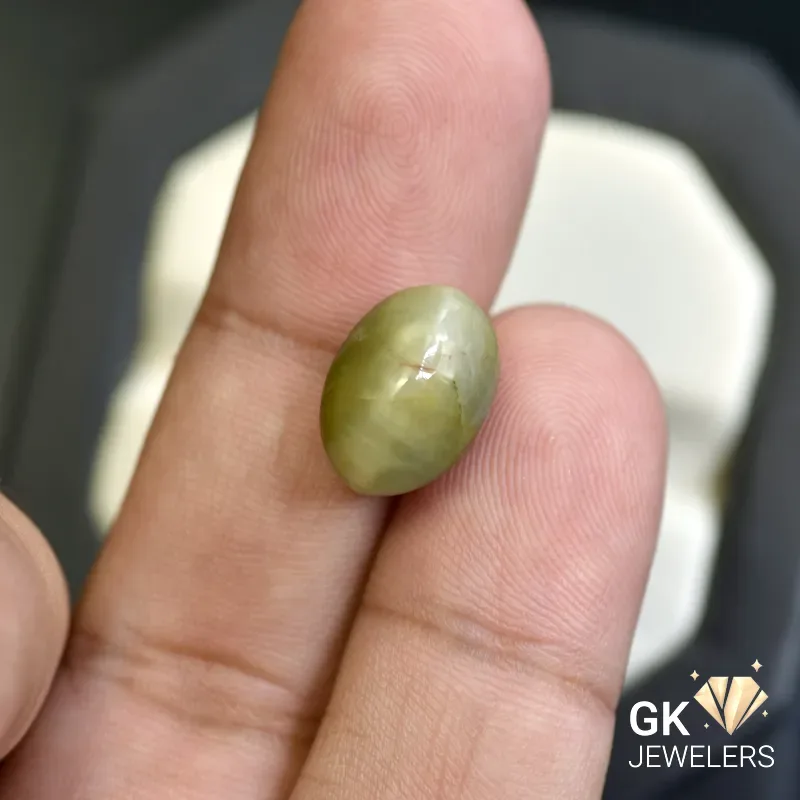 natural cat eye 7.74ct green cabochon stone, GK Jewelers Pakistan authentic gemstone photo