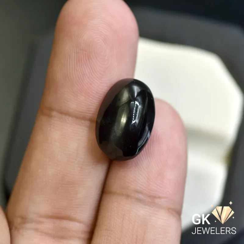 natural cat eye 15.09ct black cabochon stone, GK Jewelers Pakistan authentic gemstone photo