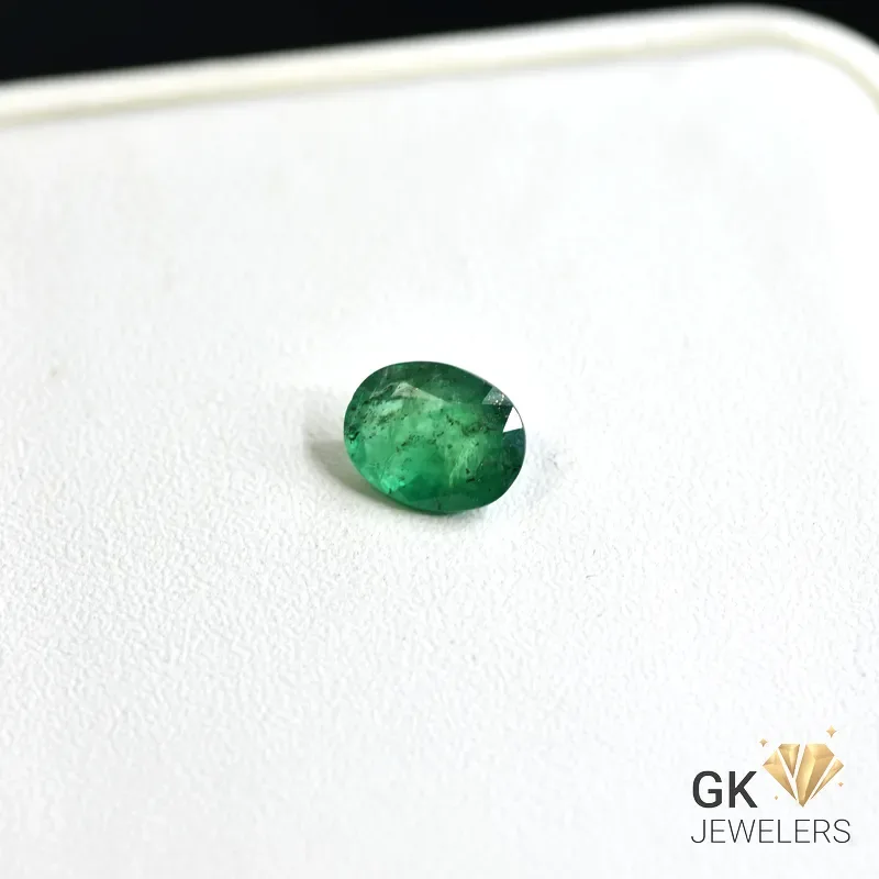 natural emerald 1.31ct green oval stone, GK Jewelers Pakistan authentic gemstone photo