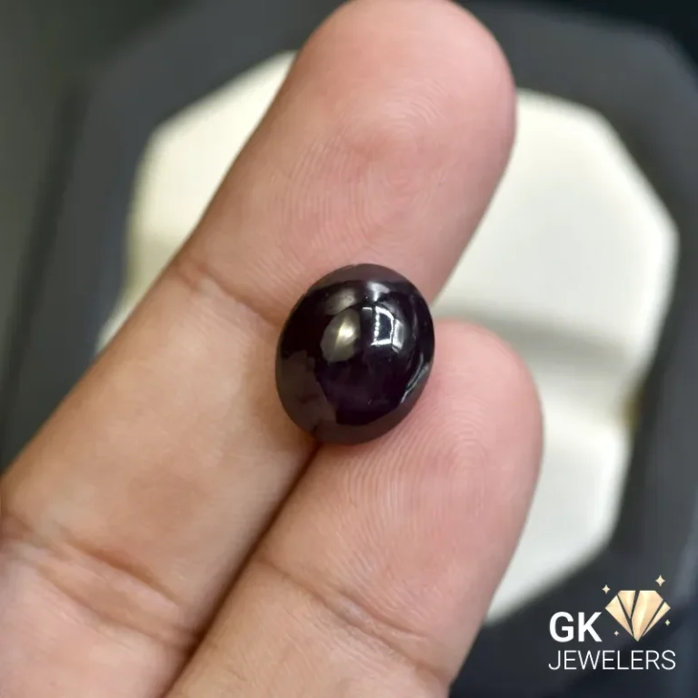 natural garnet 12.89ct reddish purple cabochon stone, GK Jewelers Pakistan authentic gemstone photo
