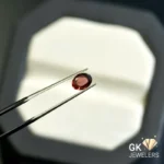 natural almandine garnet 0.84ct red oval stone, GK Jewelers Pakistan authentic gemstone photo
