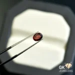 natural almandine garnet 1.36ct red oval stone, GK Jewelers Pakistan authentic gemstone photo