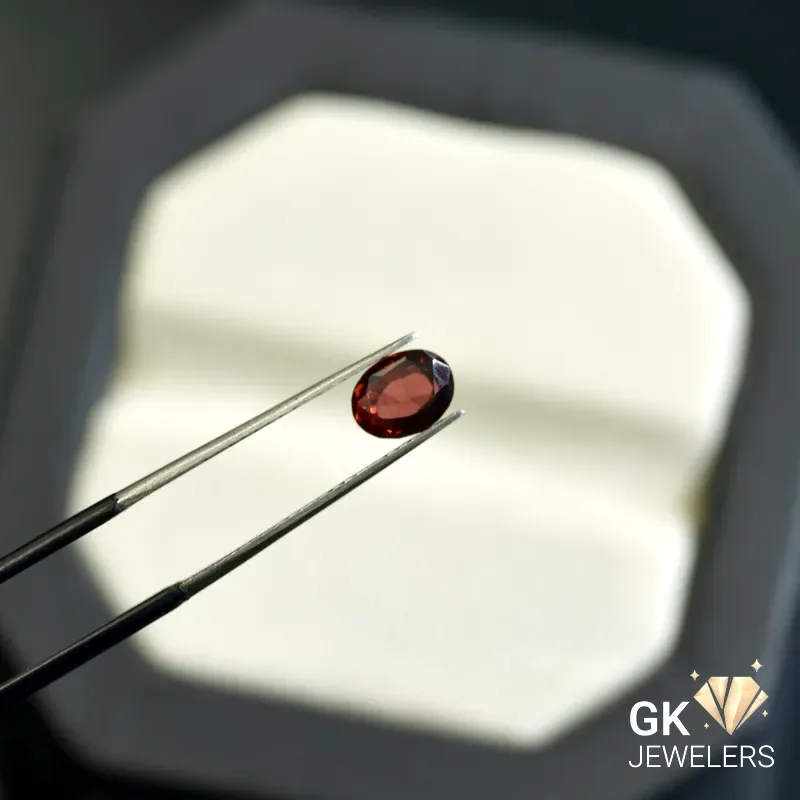 natural almandine garnet 1.36ct red oval stone, GK Jewelers Pakistan authentic gemstone photo
