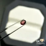 natural garnet 0.82ct red oval stone, GK Jewelers Pakistan authentic gemstone photo