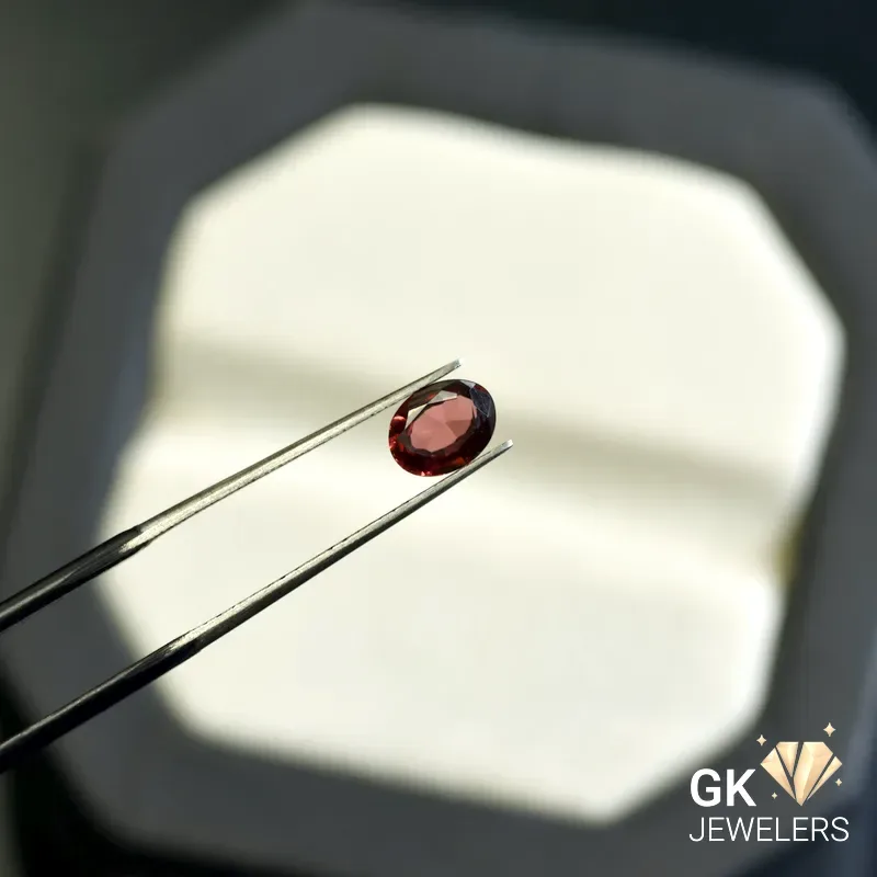 natural garnet 0.82ct red oval stone, GK Jewelers Pakistan authentic gemstone photo