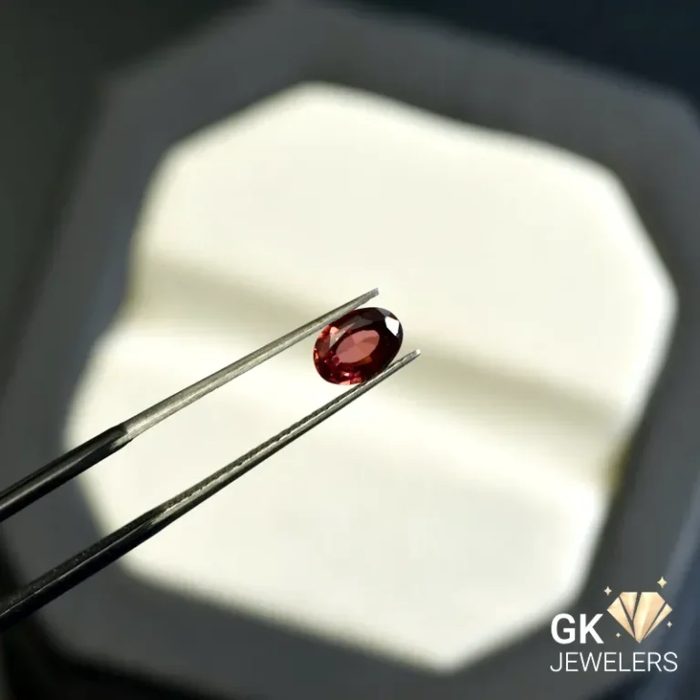 natural almandine garnet 1.09ct red oval stone - GK Jewelers Pakistan authentic gemstone photo