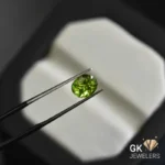 natural peridot 1.83ct green oval stone - GK Jewelers Pakistan authentic gemstone photo