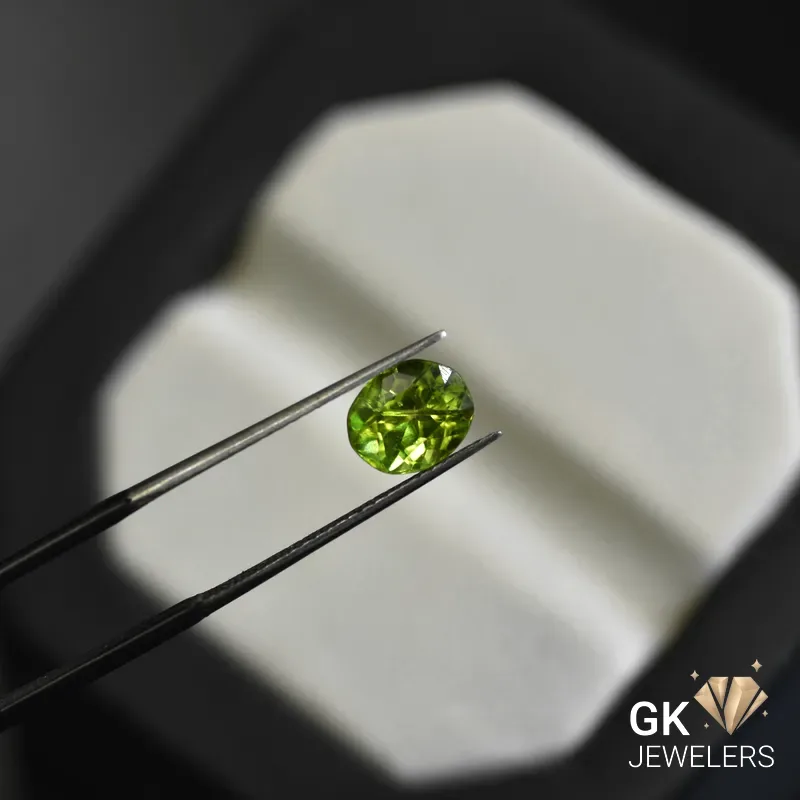 natural peridot 1.83ct green oval stone - GK Jewelers Pakistan authentic gemstone photo