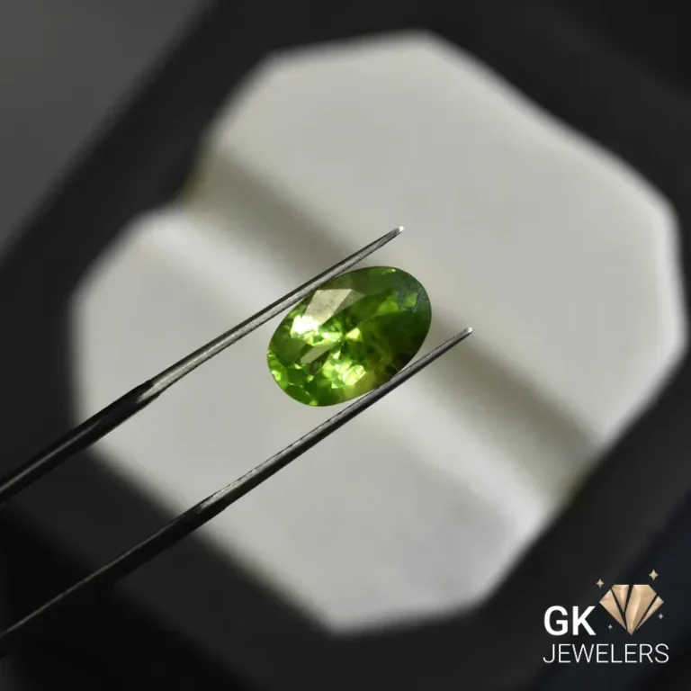 natural peridot 3.93ct green oval stone, GK Jewelers Pakistan authentic gemstone photo