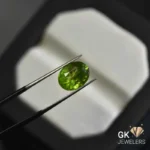 natural peridot 4.73ct green oval stone, GK Jewelers Pakistan authentic gemstone photo