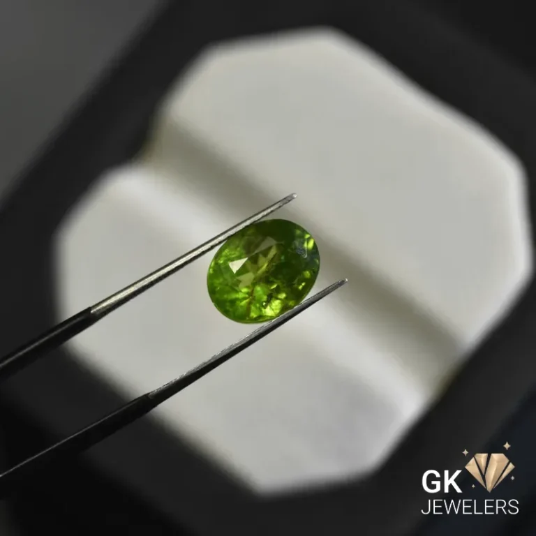natural peridot 4.73ct green oval stone, GK Jewelers Pakistan authentic gemstone photo