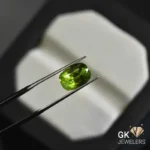 natural peridot 3.36ct green cushion stone GK Jewelers Pakistan authentic gemstone photo