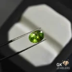 natural peridot 3.35ct green oval stone, GK Jewelers Pakistan authentic gemstone photo