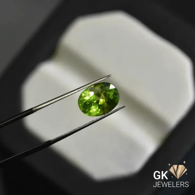 natural peridot 3.35ct green oval stone, GK Jewelers Pakistan authentic gemstone photo