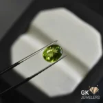natural peridot 2.92ct green oval stone, GK Jewelers Pakistan authentic gemstone photo