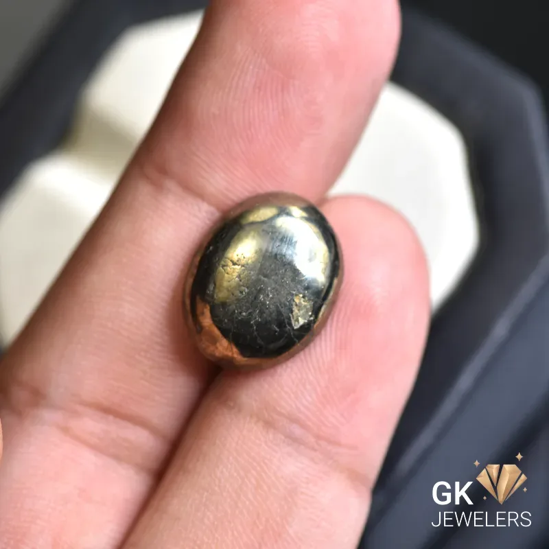 natural pyrite 15.16ct yellow oval stone, GK Jewelers Pakistan authentic gemstone photo