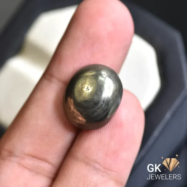 natural pyrite 28.68ct yellow oval stone, GK Jewelers Pakistan authentic gemstone photo