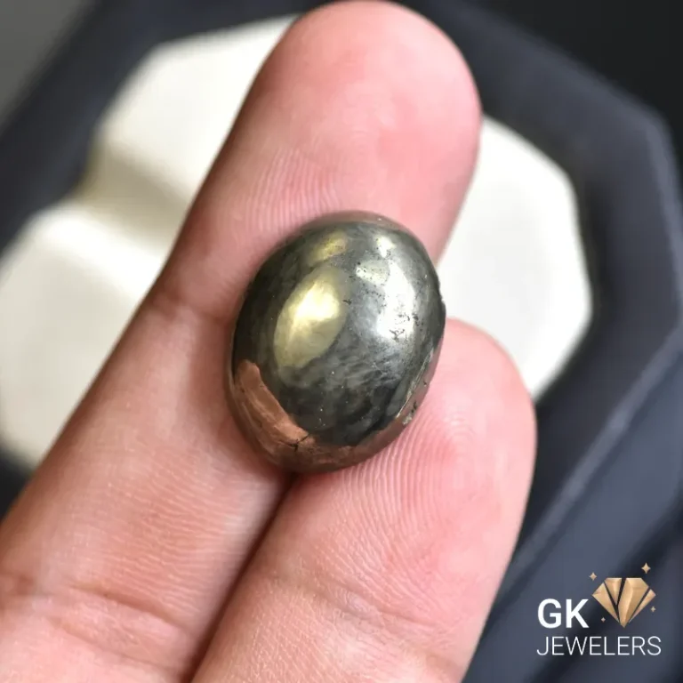 natural pyrite 26.33ct yellow oval stone, GK Jewelers Pakistan authentic gemstone photo