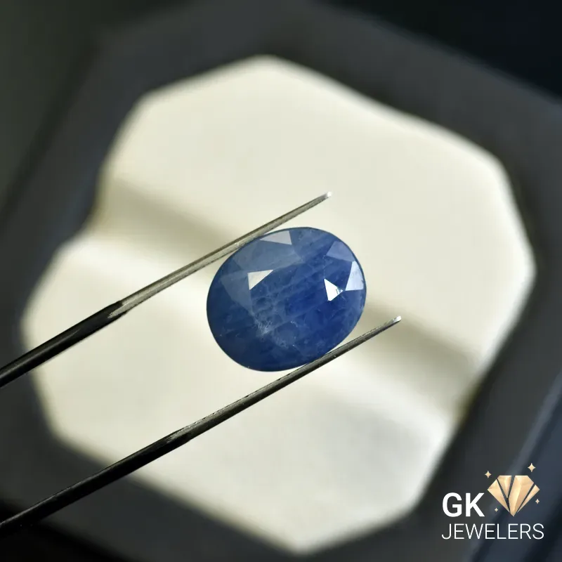 natural sapphire 10.55ct blue oval stone, GK Jewelers Pakistan authentic gemstone photo