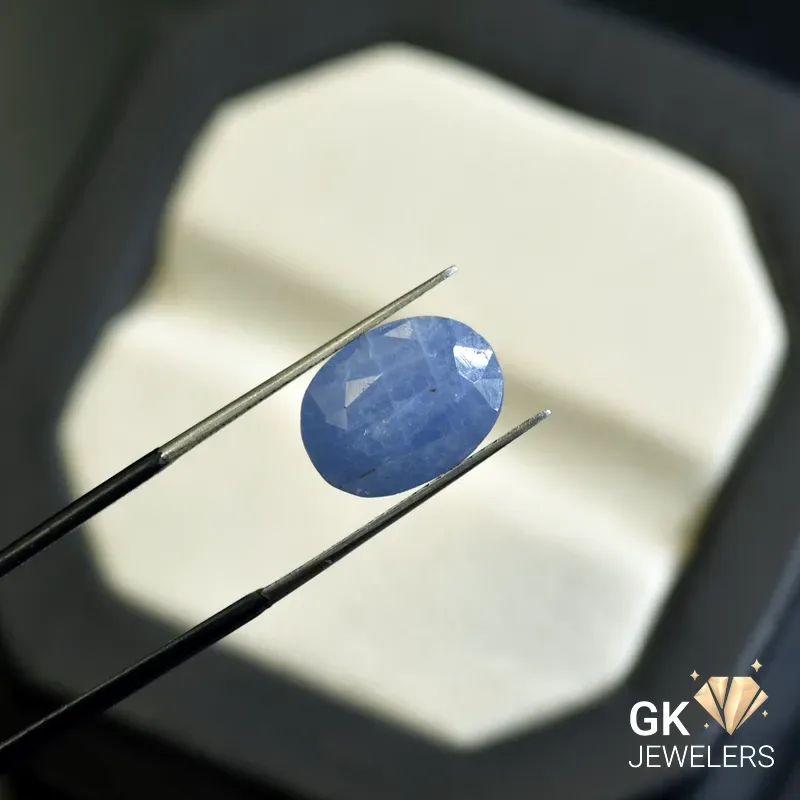 natural sapphire 3.85ct blue oval stone, GK Jewelers Pakistan authentic gemstone photo
