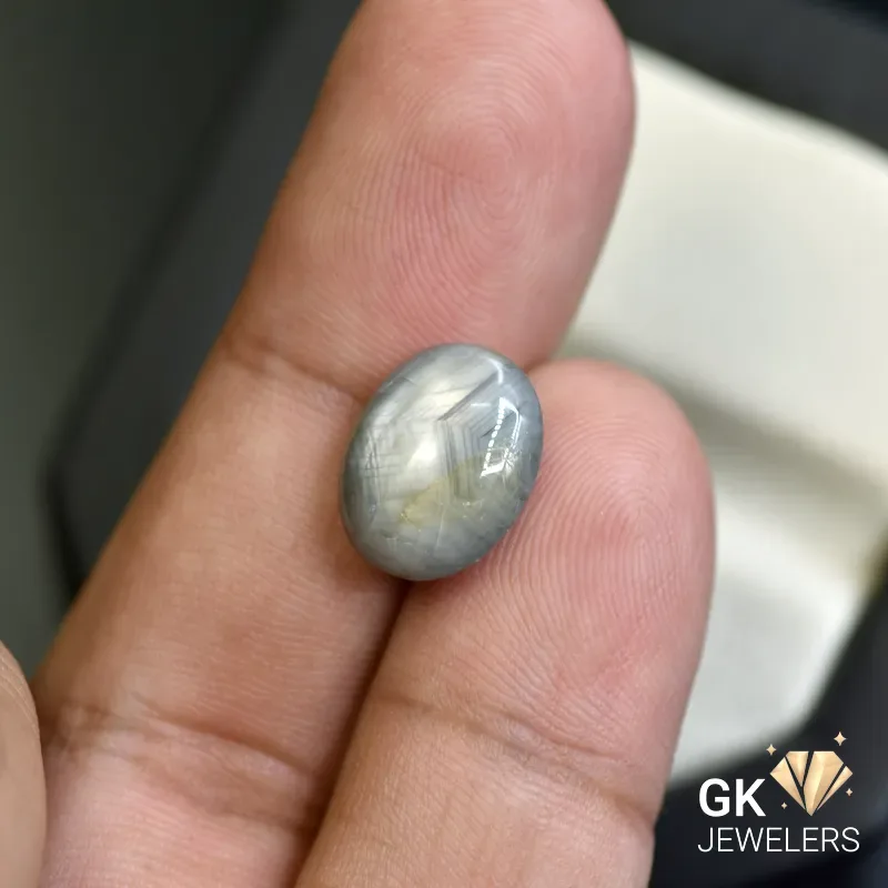 natural star sapphire 8.27ct cabochon stone: GK Jewelers Pakistan authentic gemstone photo
