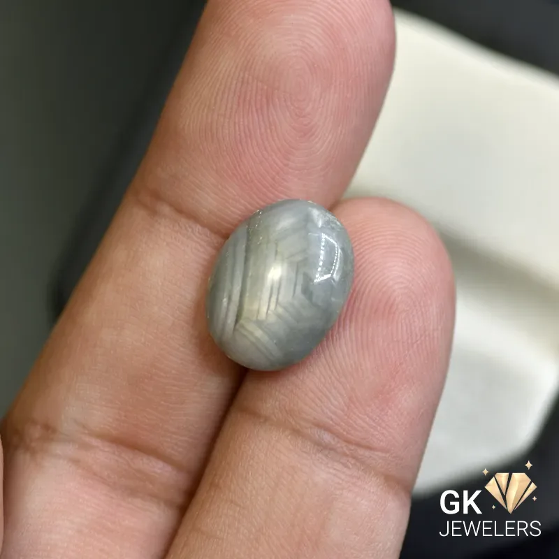 natural star sapphire 10.39ct gray cabochon stone, GK Jewelers Pakistan authentic gemstone photo