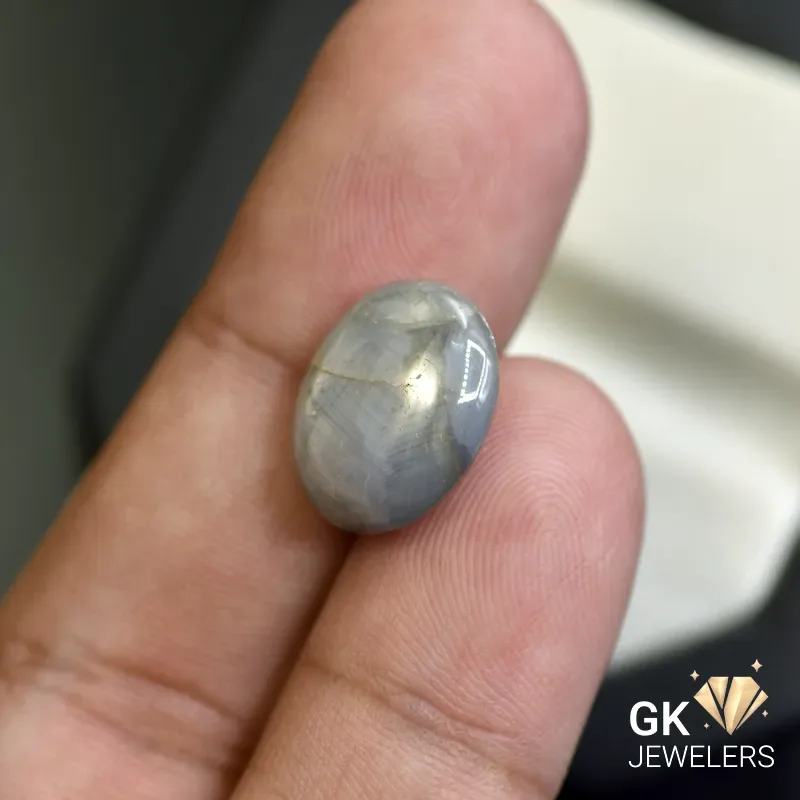 natural sapphire 13.35ct gray cabochon stone, GK Jewelers Pakistan authentic gemstone photo