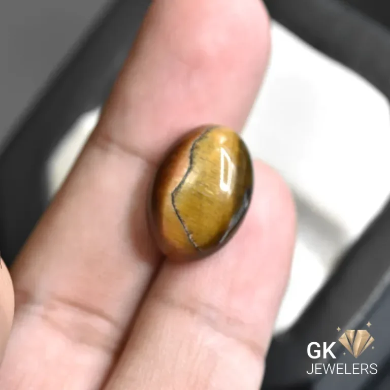 natural tiger eye 51.01ct brown oval stone, GK Jewelers Pakistan authentic gemstone photo