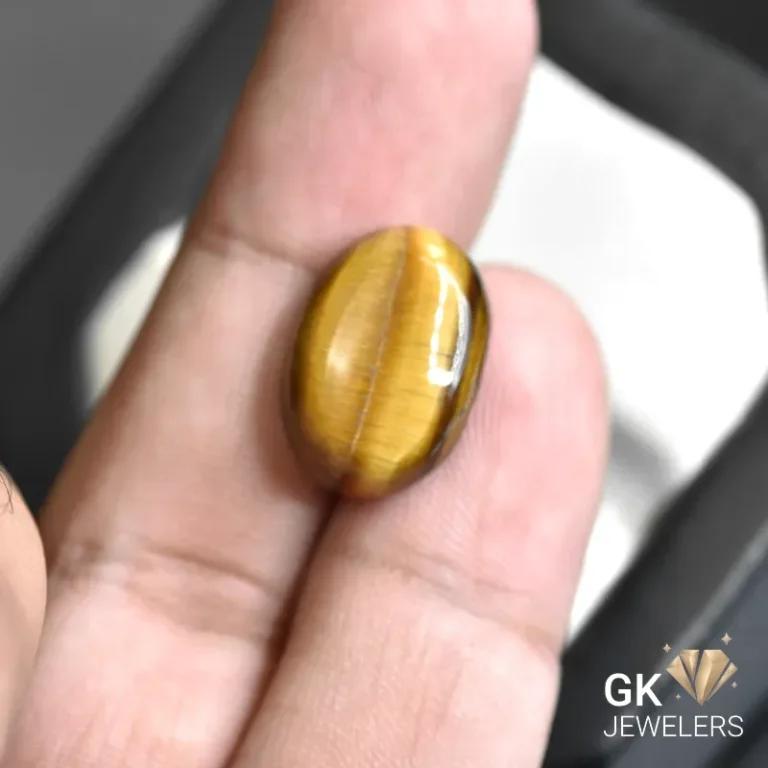 natural tiger eye 11.41ct brown oval stone, GK Jewelers Pakistan authentic gemstone photo