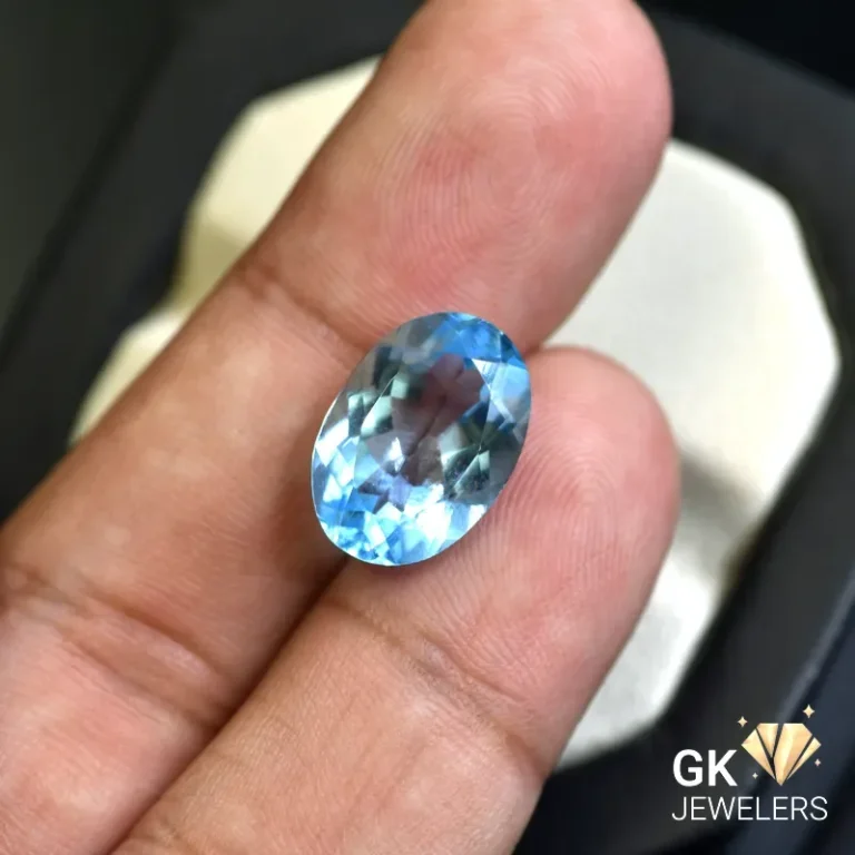natural topaz 9.50ct blue oval stone, GK Jewelers Pakistan authentic gemstone photo