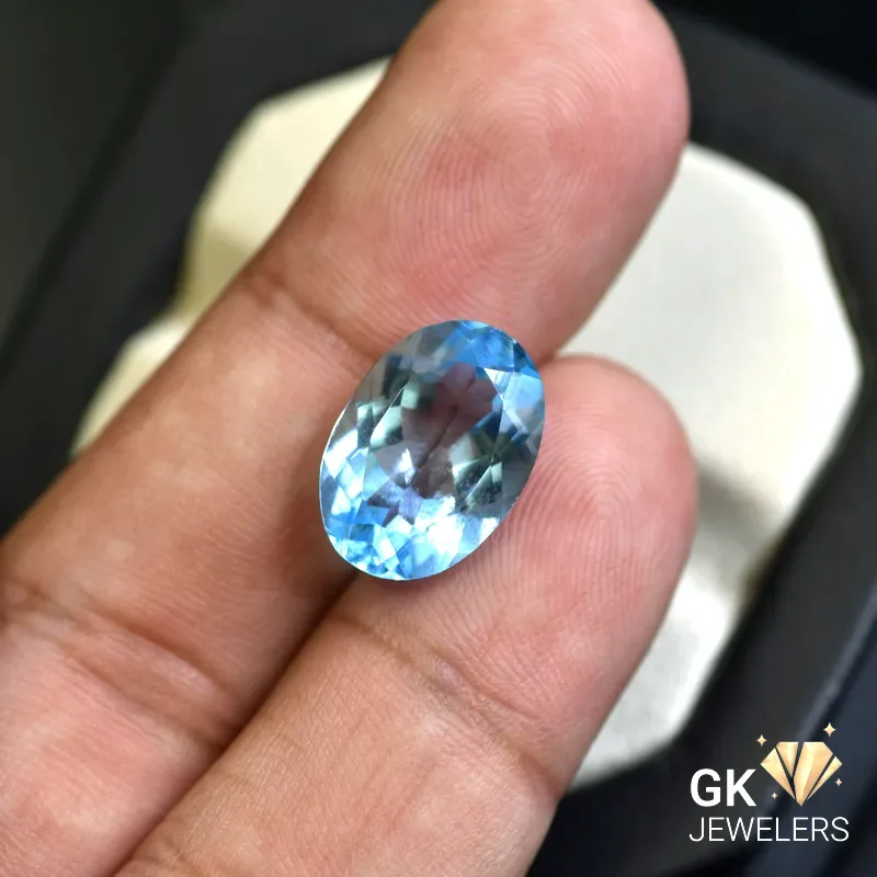natural topaz 9.50ct blue oval stone, GK Jewelers Pakistan authentic gemstone photo