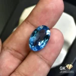 natural topaz 11.92ct blue oval stone, GK Jewelers Pakistan authentic gemstone photo