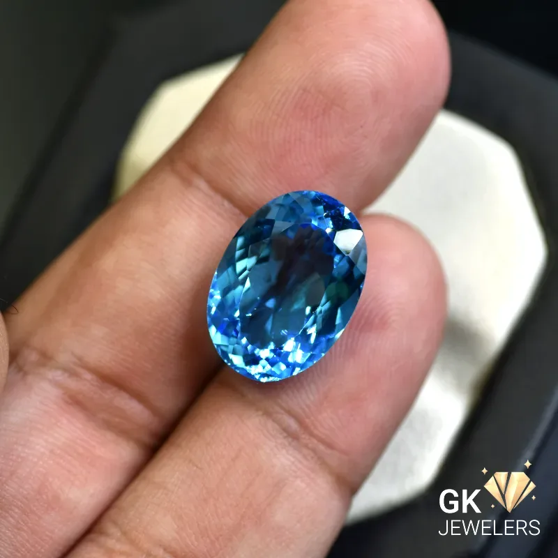 natural topaz 15.92ct blue oval stone GK Jewelers Pakistan authentic gemstone photo
