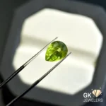 natural peridot 4.09ct green pear stone, GK Jewelers Pakistan authentic gemstone photo