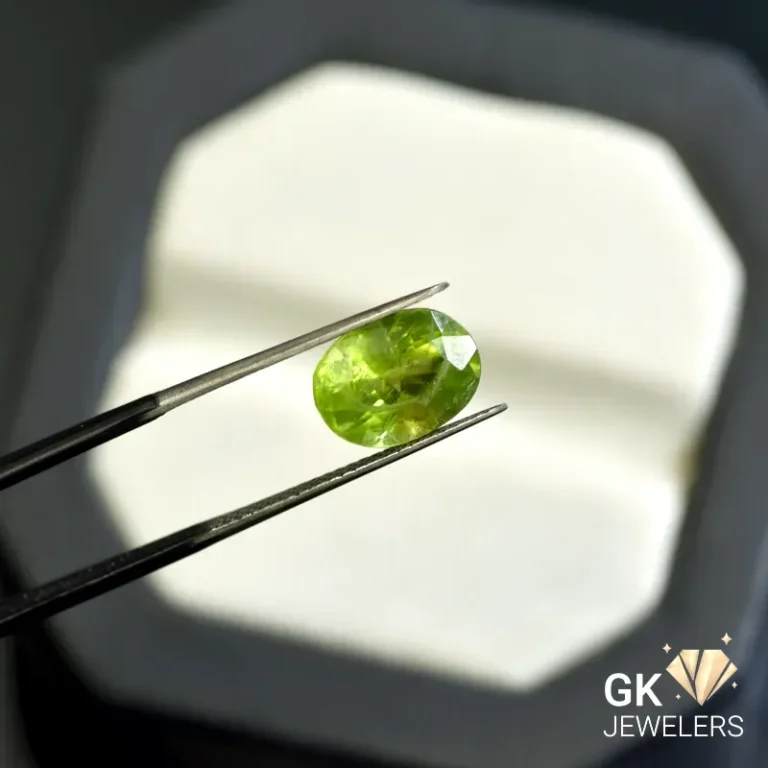 natural peridot 4.18ct green oval stone, GK Jewelers Pakistan authentic gemstone photo