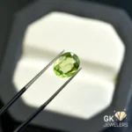 natural peridot 3.24ct green oval stone, GK Jewelers Pakistan authentic gemstone photo