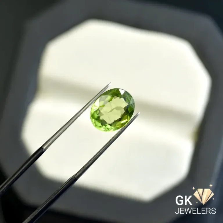 natural peridot 3.24ct green oval stone, GK Jewelers Pakistan authentic gemstone photo