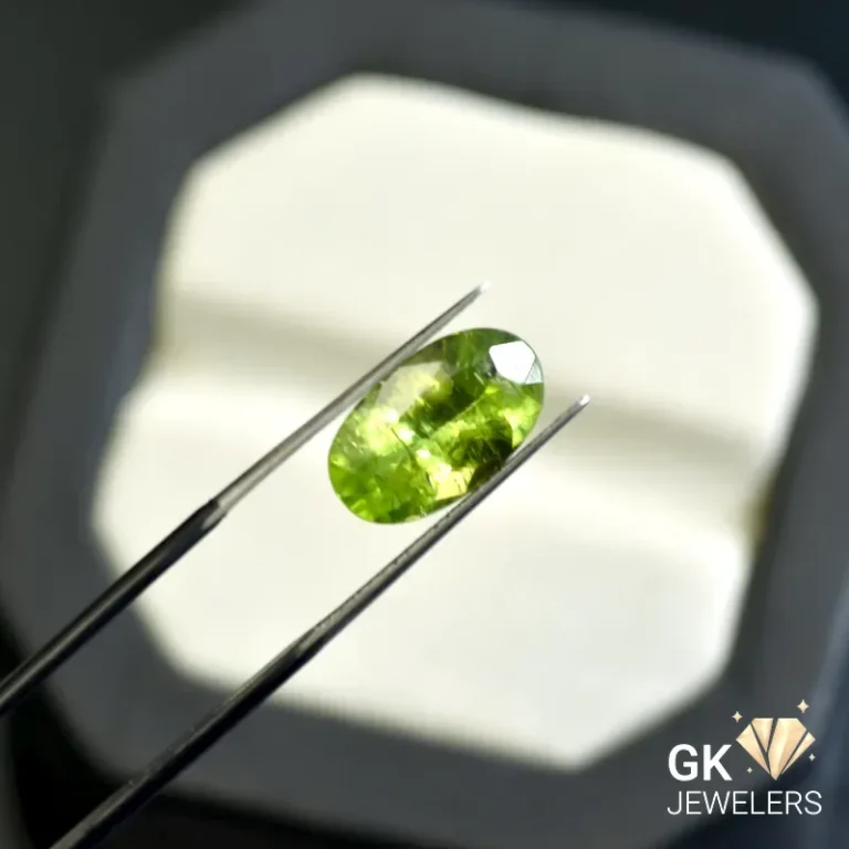 natural peridot 5.11ct green oval stone: GK Jewelers Pakistan authentic gemstone photo