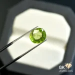 natural peridot 4.53ct green cushion stone, GK Jewelers Pakistan authentic gemstone photo